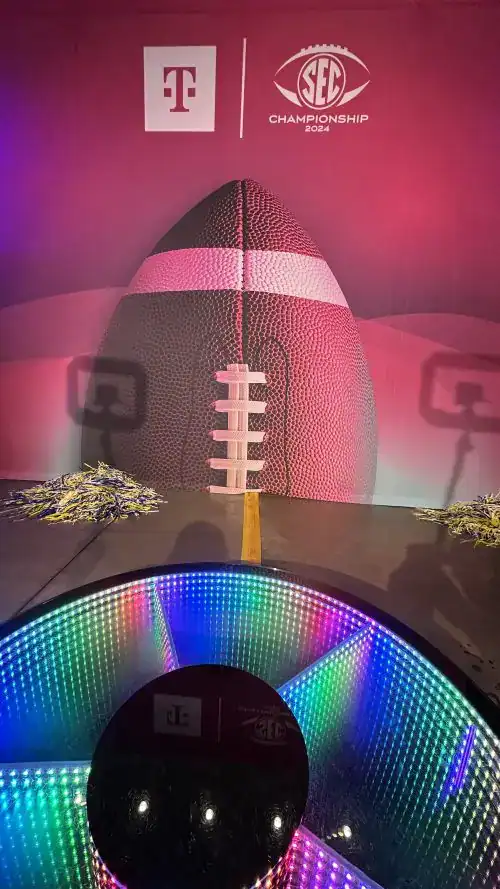 Football-themed photo booth with LED lighting for events in Atlanta.