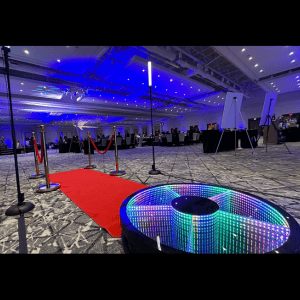 Indoor event space with photo booth, red carpet, and lighting for Atlanta photo booth rental.