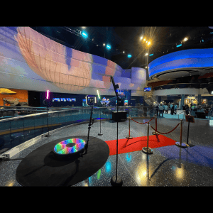 Modern event space with photo booth setup and colorful lighting in Atlanta.