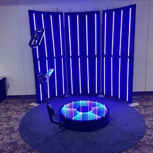 LED photo booth with circular mirror and vertical light bars in Atlanta.