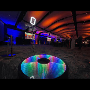 Colorful LED photo booth at an event in Atlanta with vibrant lighting.