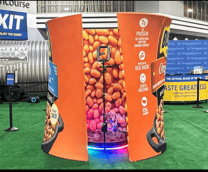Interactive photo booth with colorful LED lights at Atlanta event venue.