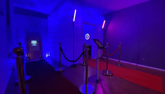 Photo booth setup with red carpet at Atlanta event venue.