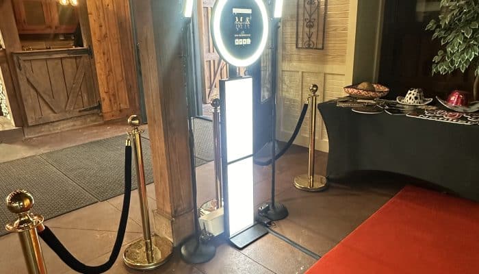 Photo booth with ring light at event entrance in Atlanta.